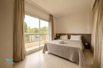 1 dorm. com suíte e vaga de garagem a poucos metros do mar