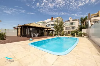 2 dorm. com 1 suíte em Edifício frente mar com saída privada a praia